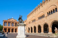 In Piazza Cavour, bordered by ancient buildings such as Palazzo dell'Arengo and Palazzo del Podest?, both hosting a museum, stands out the monument to pope Paolo V, a bronze work of Sebastiano Sebastiani of 1614.